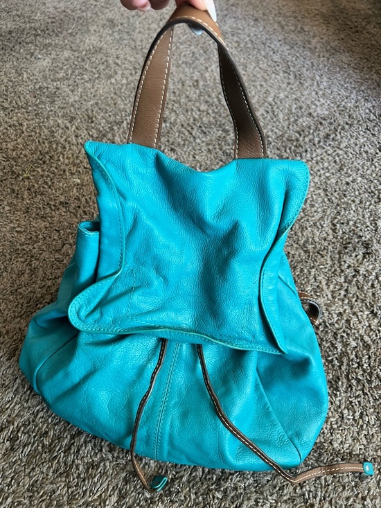 Nino BOSSI Handbags - Nino BOSSI Turquoise Leather Drawstring Shoulder Bag with Brown Handles